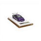 Lot57Supplies Diecast Shop 1:64 scale purple Nissan Skyline R34 GIFTED resin model car on a white display base.