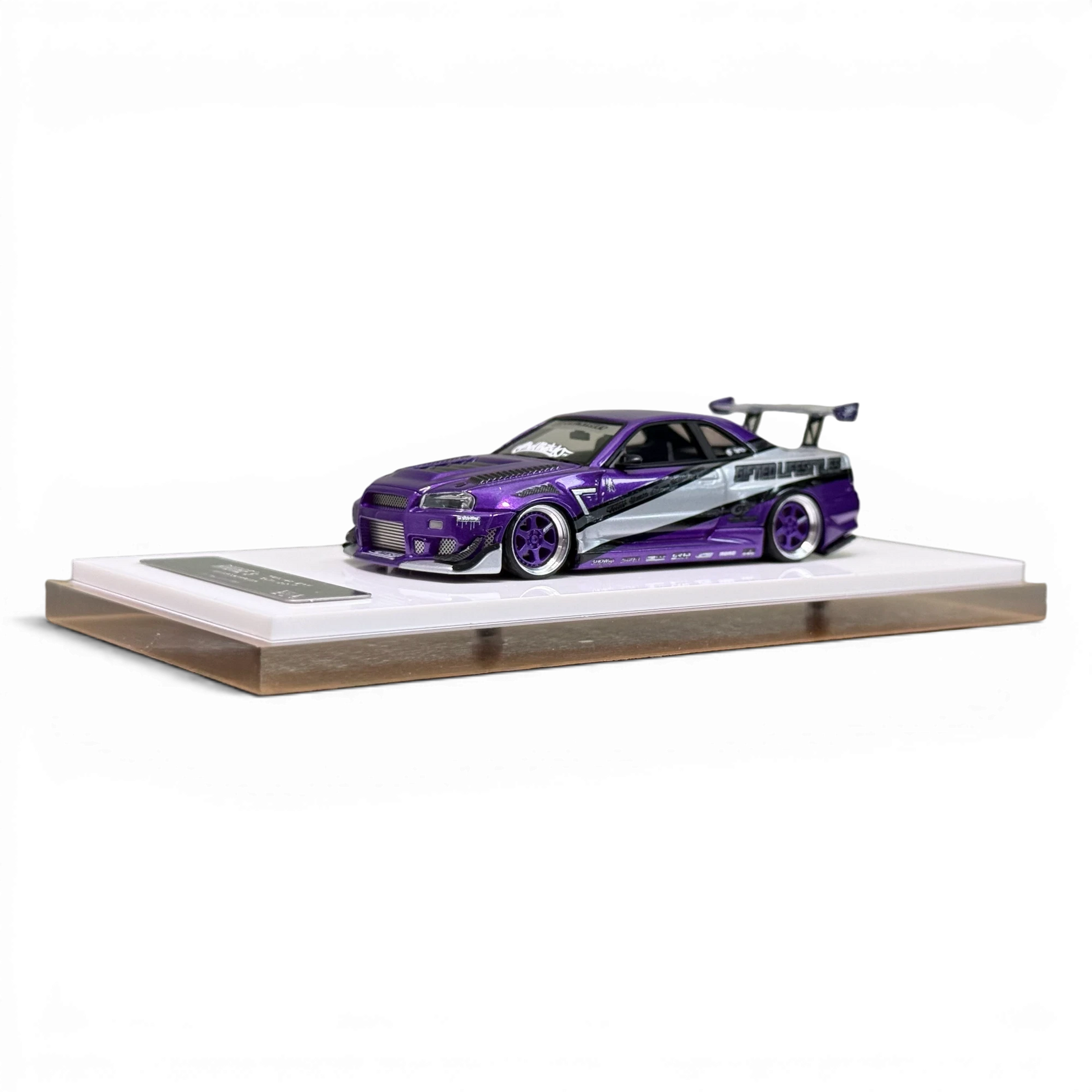 Lot57Supplies Diecast Shop 1:64 scale purple Nissan Skyline R34 GIFTED resin model car with custom racing livery