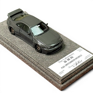 Lot57Supplies Diecast Shop 1:64 scale The Laboratory x Zonzo Garage Active R33 widebody model in full visible carbon.