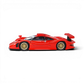 Lot57Supplies Diecast Shop red Porsche 911 GT1 1998 diecast model car in 1:64 scale with gold wheels, side profile view.