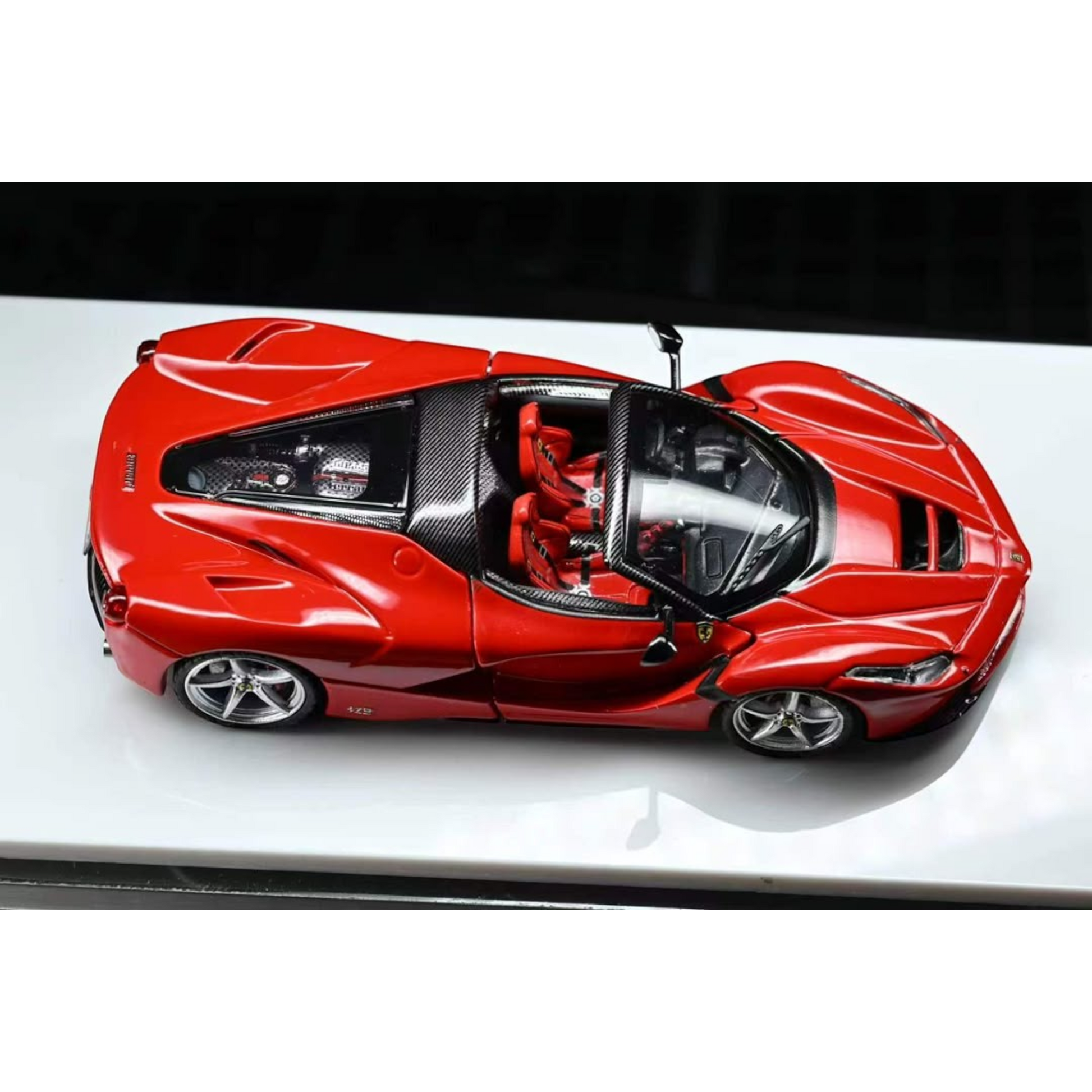 Lot57Supplies Diecast Shop Street Buster 1:64 scale diecast supercar F150 in Rosso Corsa red with open top and red interior