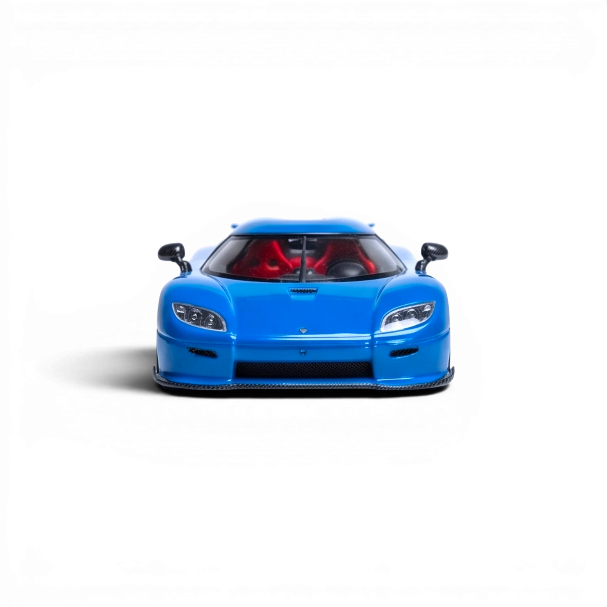 Lot57Supplies Diecast Shop blue 1:64 scale Rhino Model Koenigsegg CC850 diecast car with red interior.