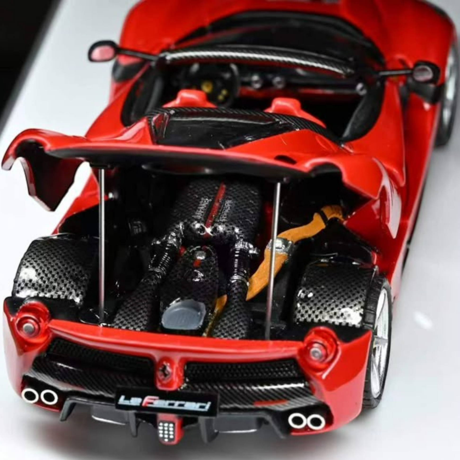 Lot57Supplies Diecast Shop 1:64 scale Street Buster Rosso Corsa supercar model with open engine bay and red interior