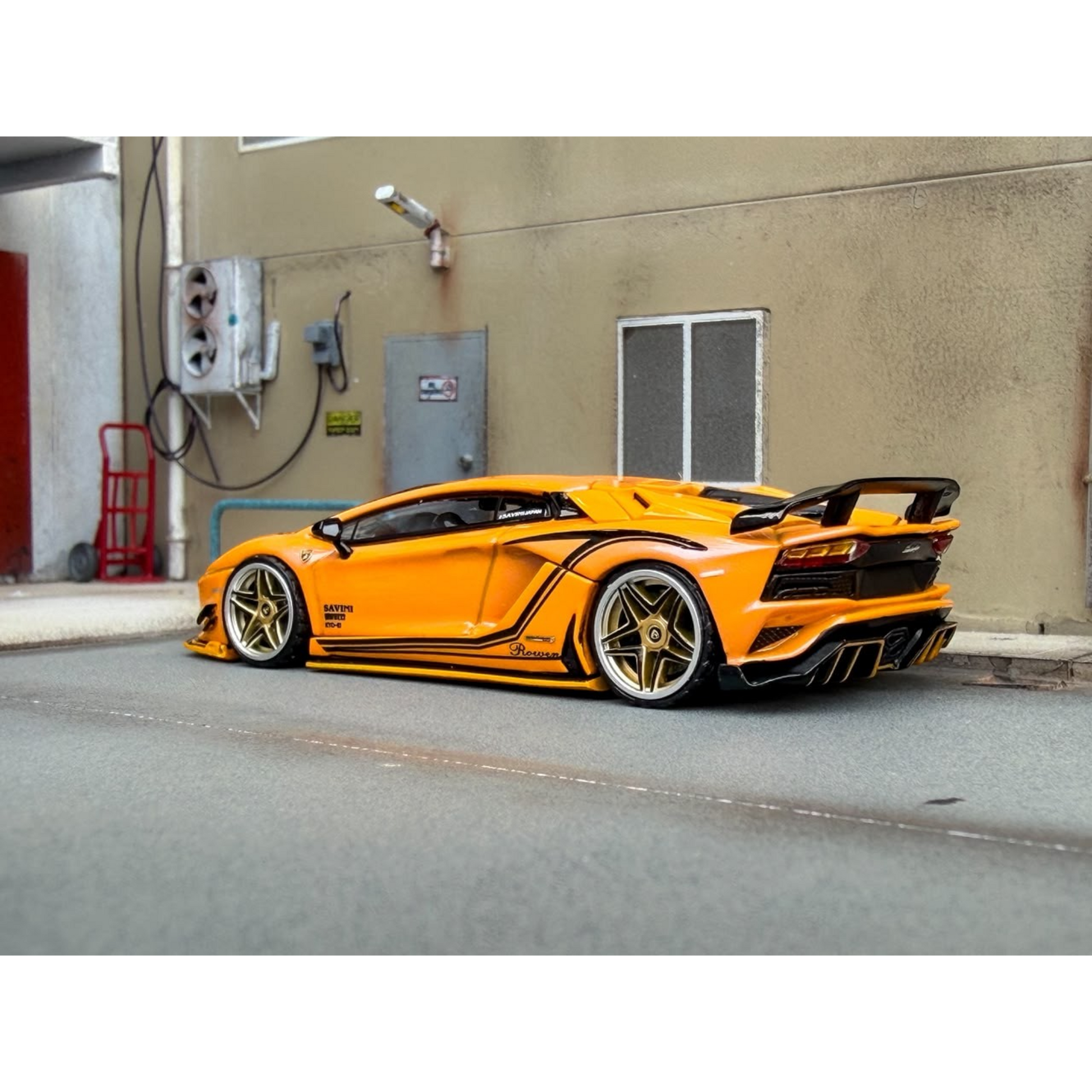 Lot57Supplies Diecast Shop Rotating Wheel 1:64 scale iridescent yellow Rowen Aventador S diecast model car