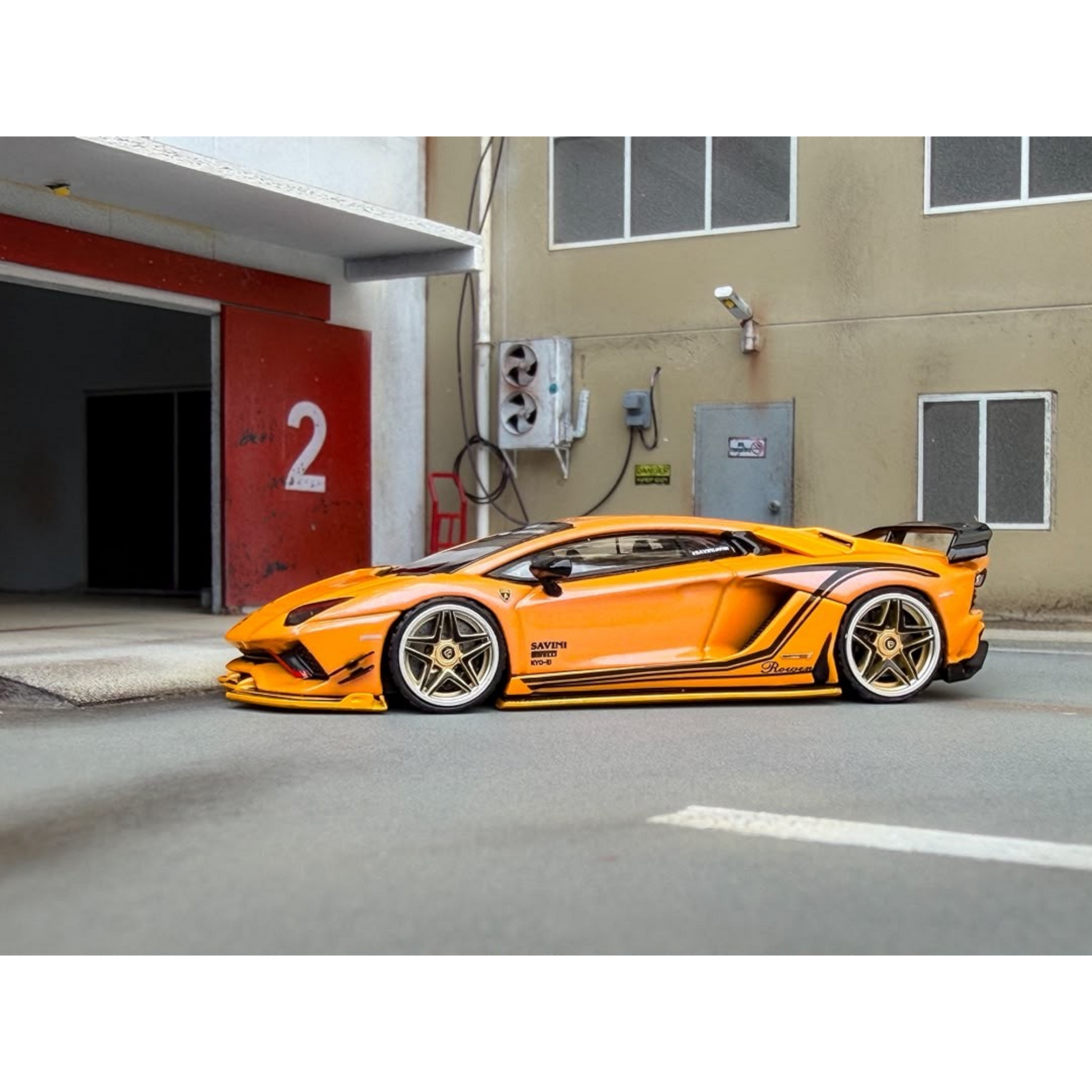 Lot57Supplies Diecast Shop 1:64 scale Rotating Wheel Rowen Aventador S diecast car in iridescent yellow with gold rims