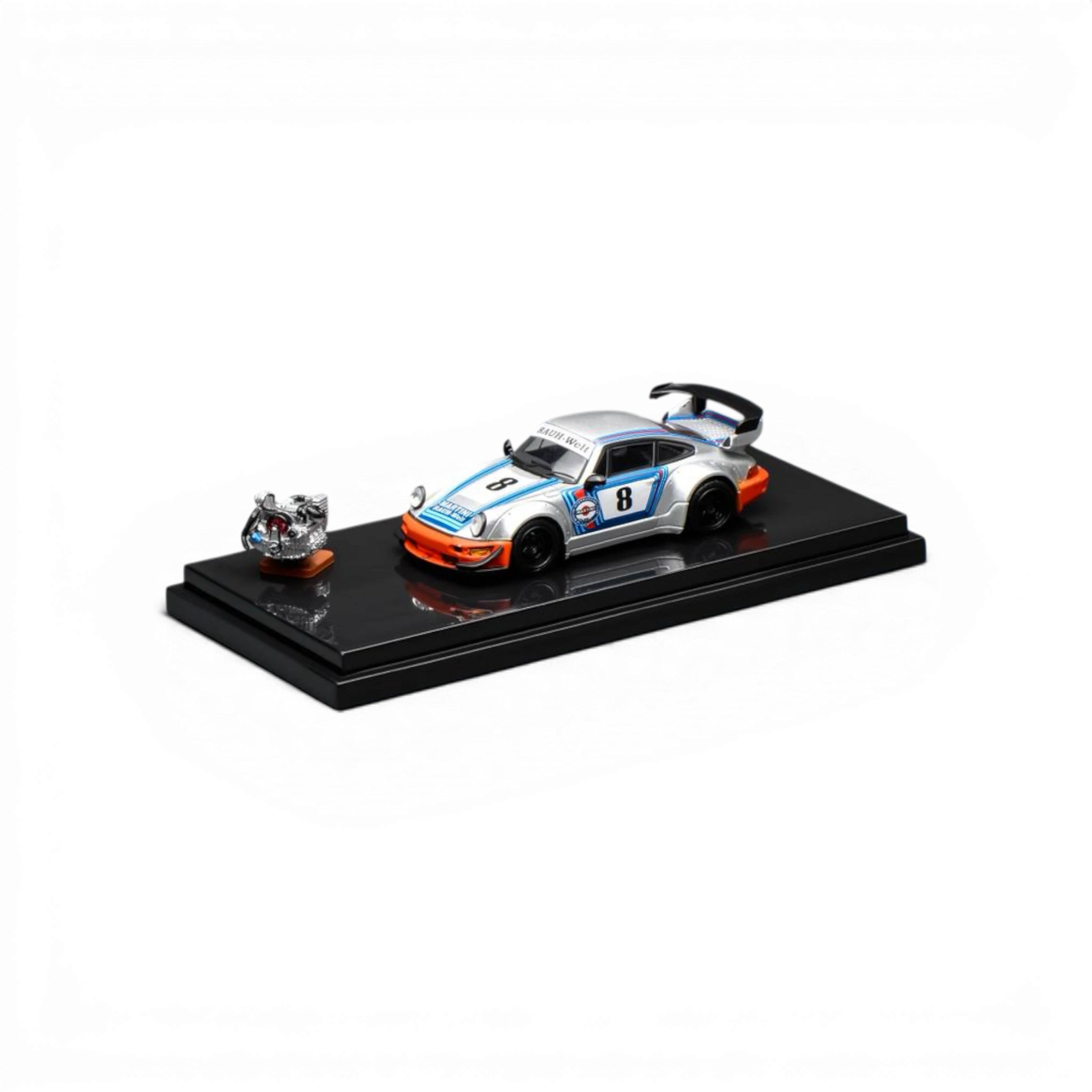 Lot57Supplies Diecast Shop 1:64 scale silver RWB 964 model car with Martini racing livery and orange accents. Includes engine replica.