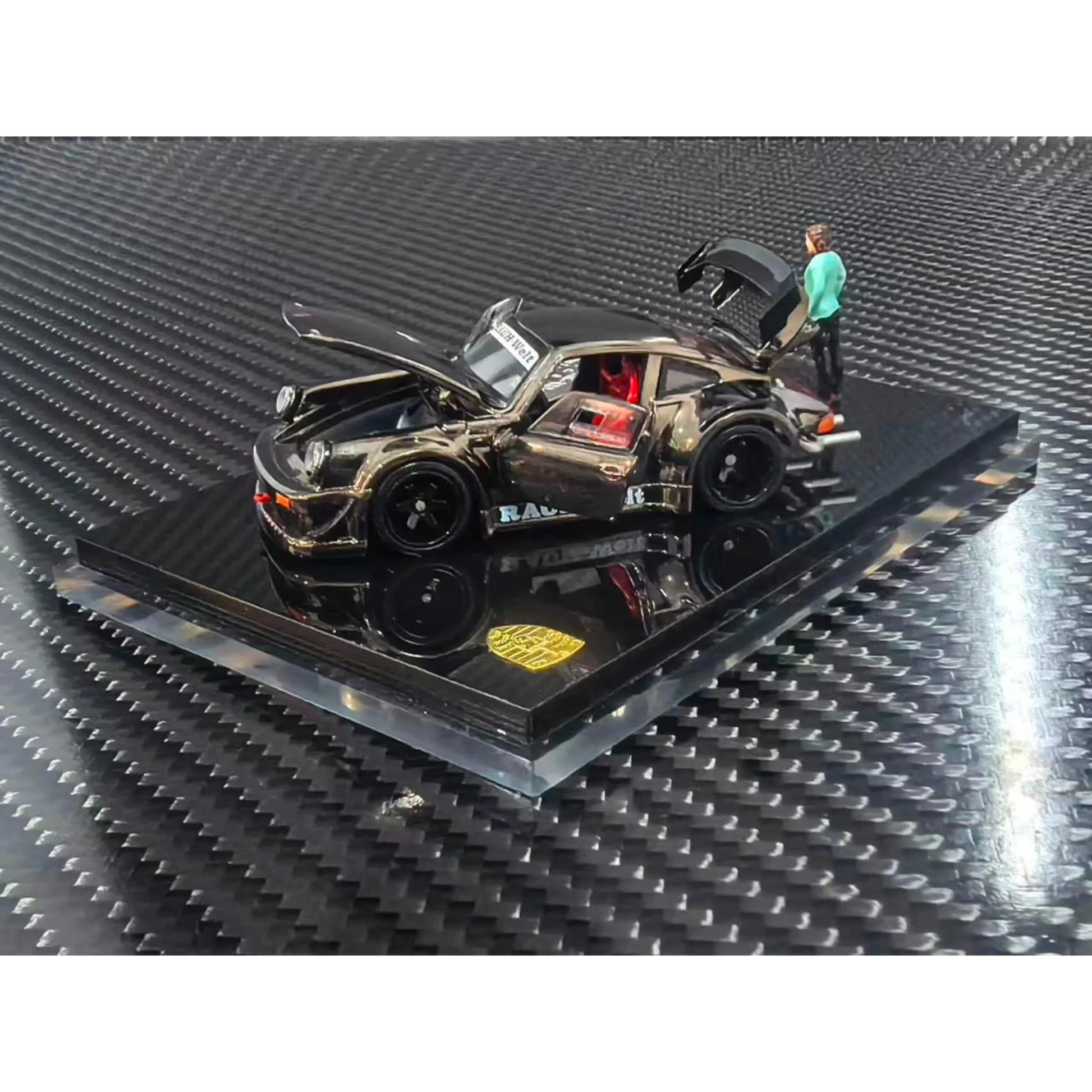 Lot57Supplies Diecast Shop 1:64 scale FG Customized Version RWB930 diecast car in chrome gunmetal with a miniature figure