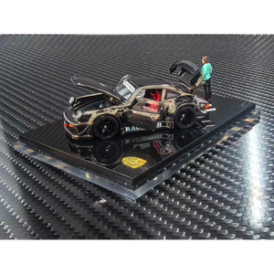 Lot57Supplies Diecast Shop 1:64 scale FG Customized Version RWB930 diecast car in chrome gunmetal with a miniature figure