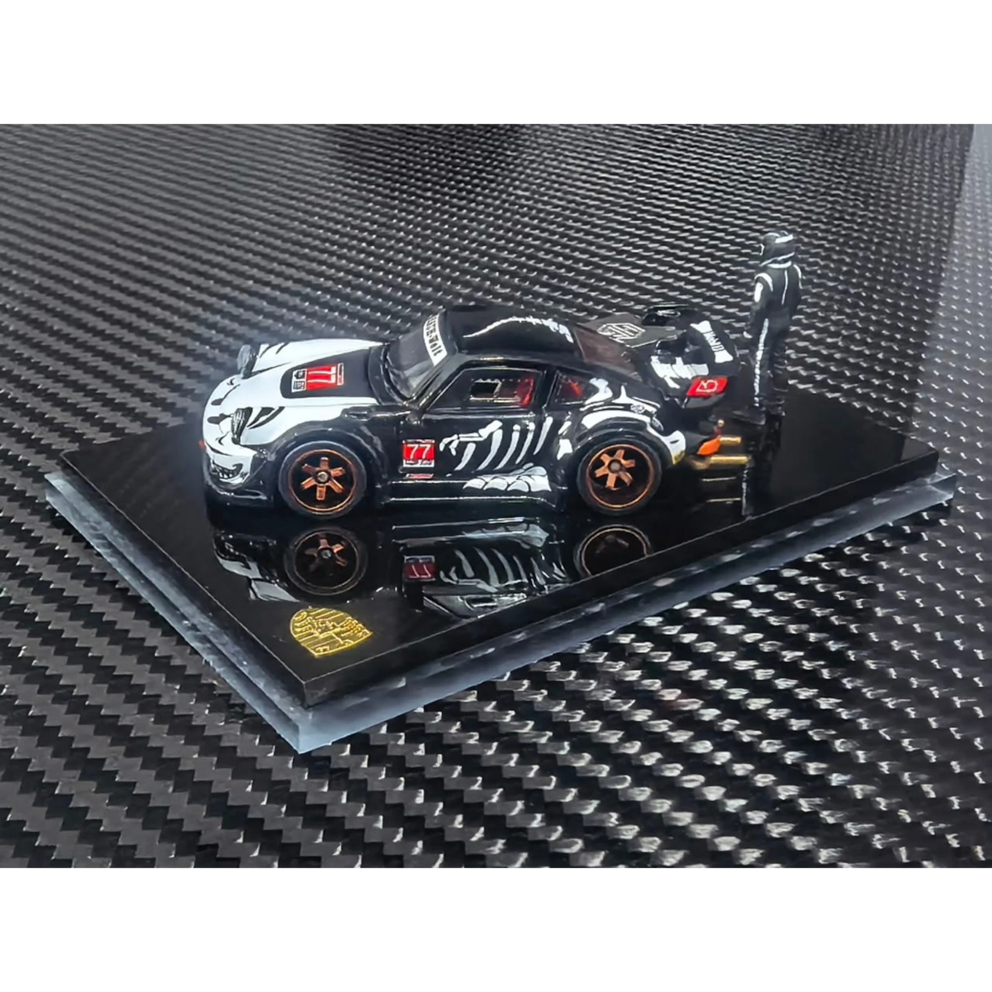 Lot57Supplies Diecast Shop 1:64 scale RWB930 diecast model car in black and white with custom skeleton graphics