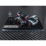 Lot57Supplies Diecast Shop 1:64 scale RWB 930 diecast model car in black with white graphics and a racing driver figure.