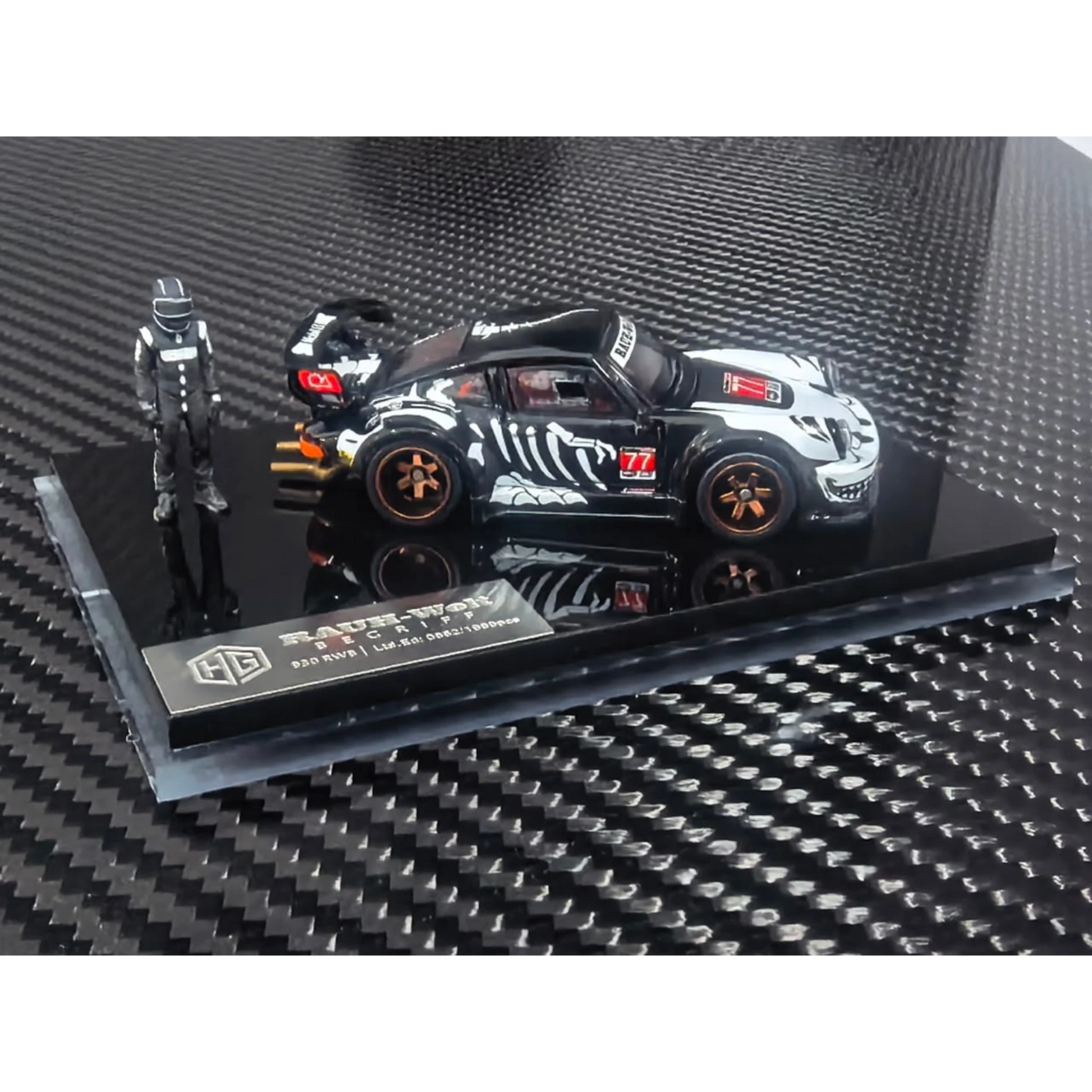 Lot57Supplies Diecast Shop 1:64 scale RWB930 diecast model car in black with white skeleton graphics and racing figure