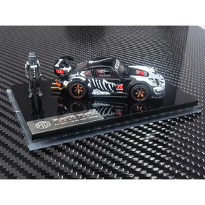 Lot57Supplies Diecast Shop 1:64 scale RWB930 diecast model car in black with white skeleton graphics and racing figure