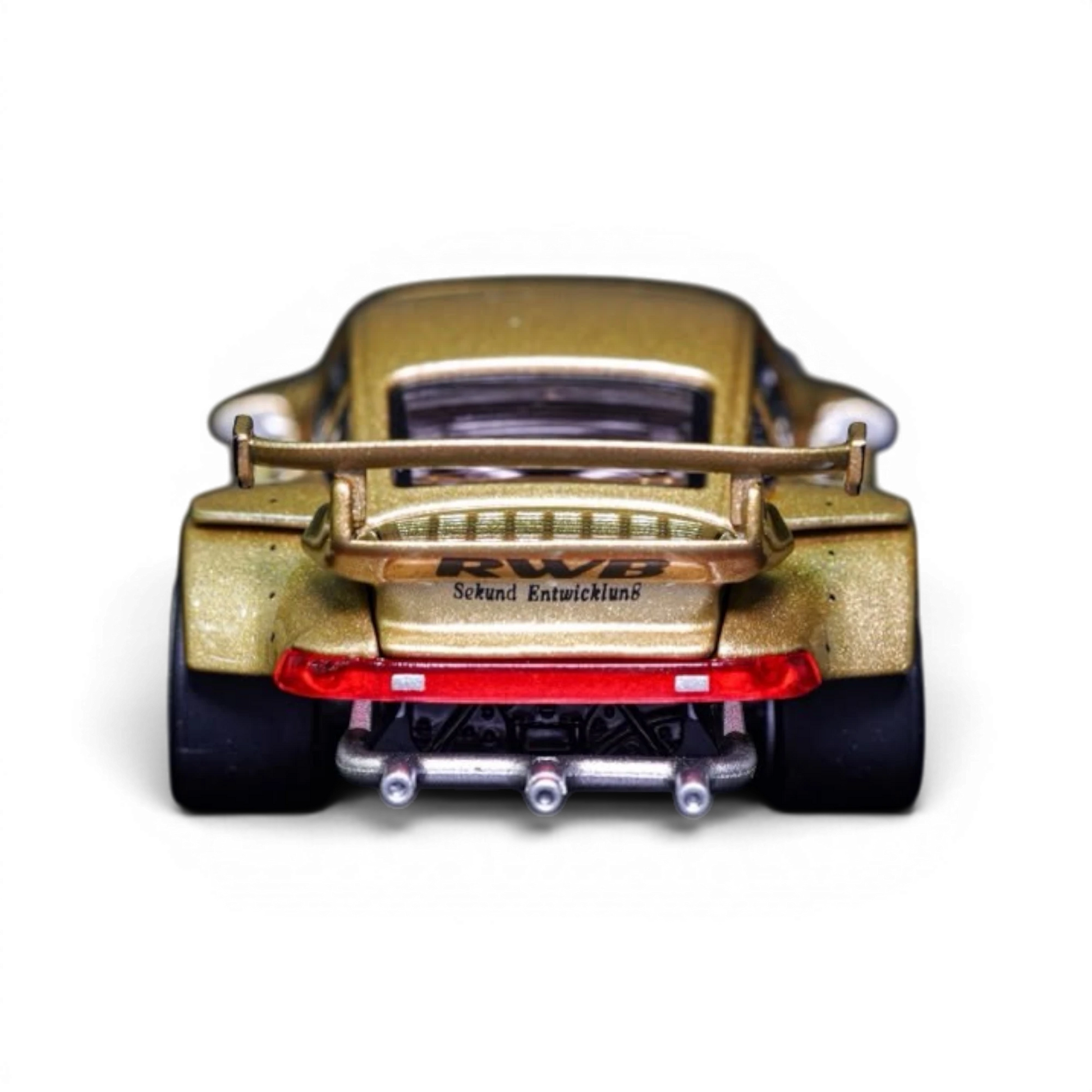 Lot57Supplies Diecast Shop TPC Customized Version RWB930 gold diecast model car, rear view with detailed spoiler