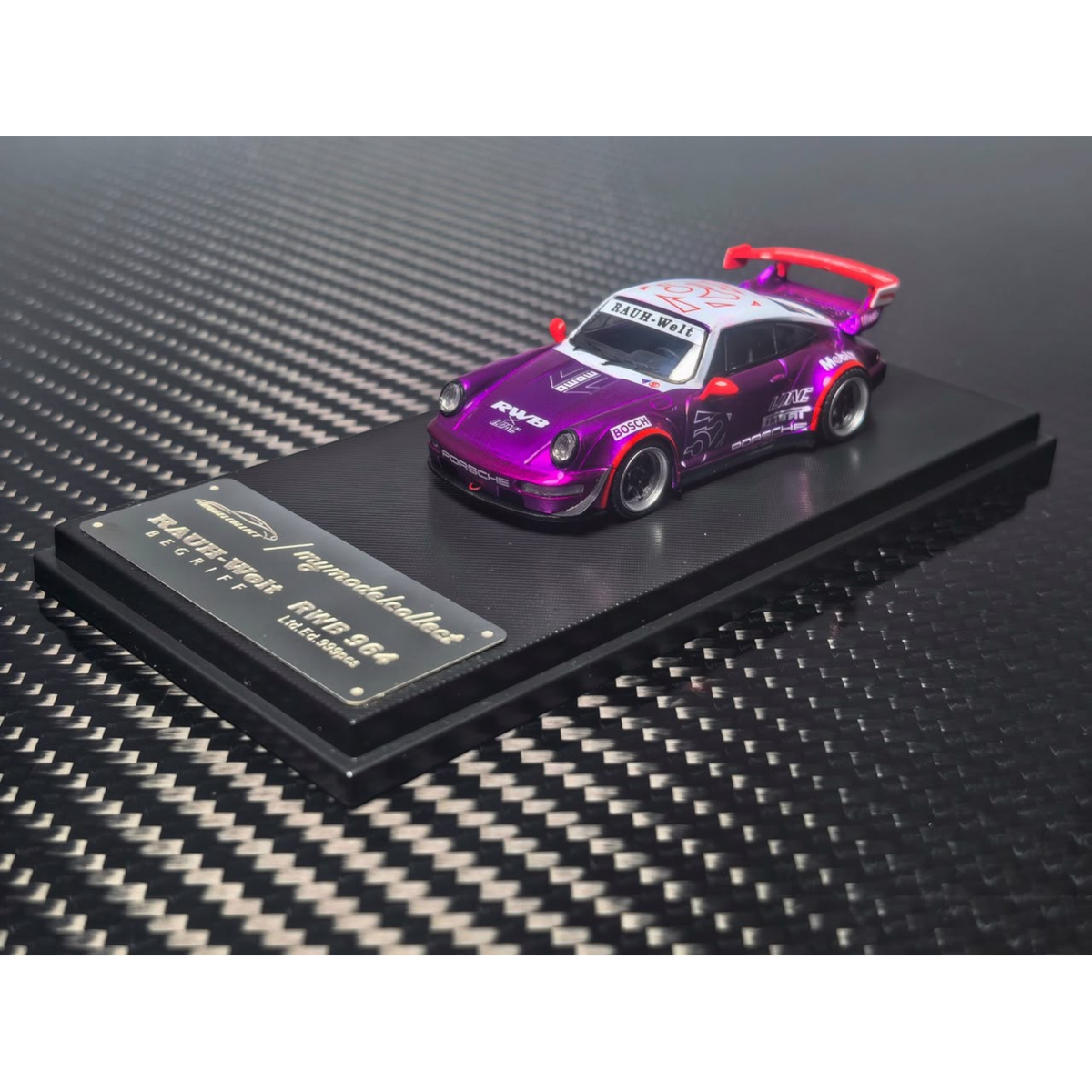Lot57Supplies Diecast Shop MC RWB964 high wing diecast car in transparent pink and purple on a display base