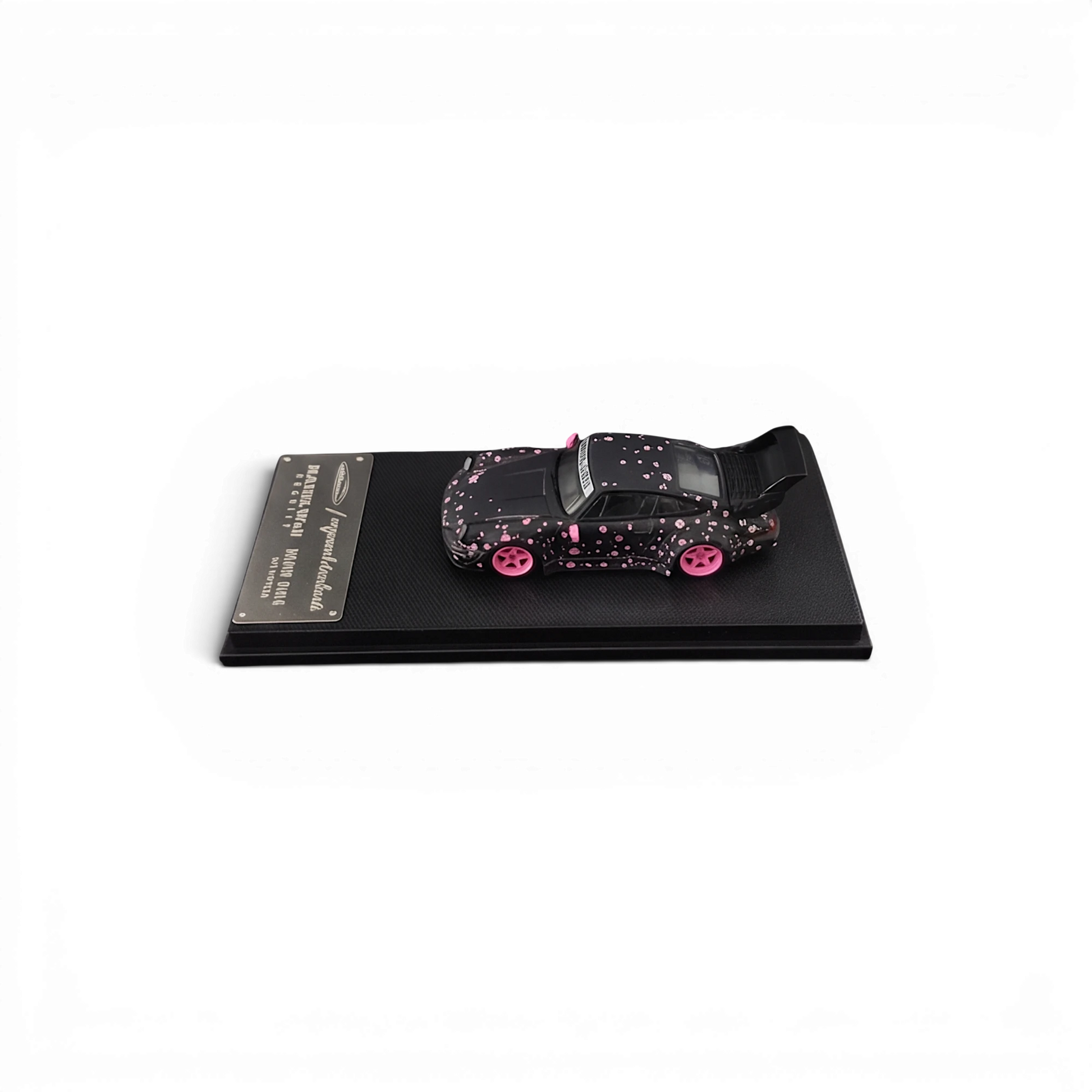 Lot57Supplies Diecast Shop MC RWB964 1:64 scale diecast car in black with pink sakura blossom livery and high wing.
