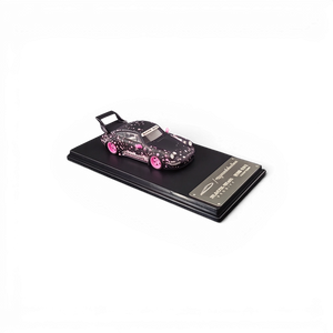 Lot57Supplies Diecast Shop MC RWB964 1:64 scale diecast car in black with pink sakura floral livery and high wing