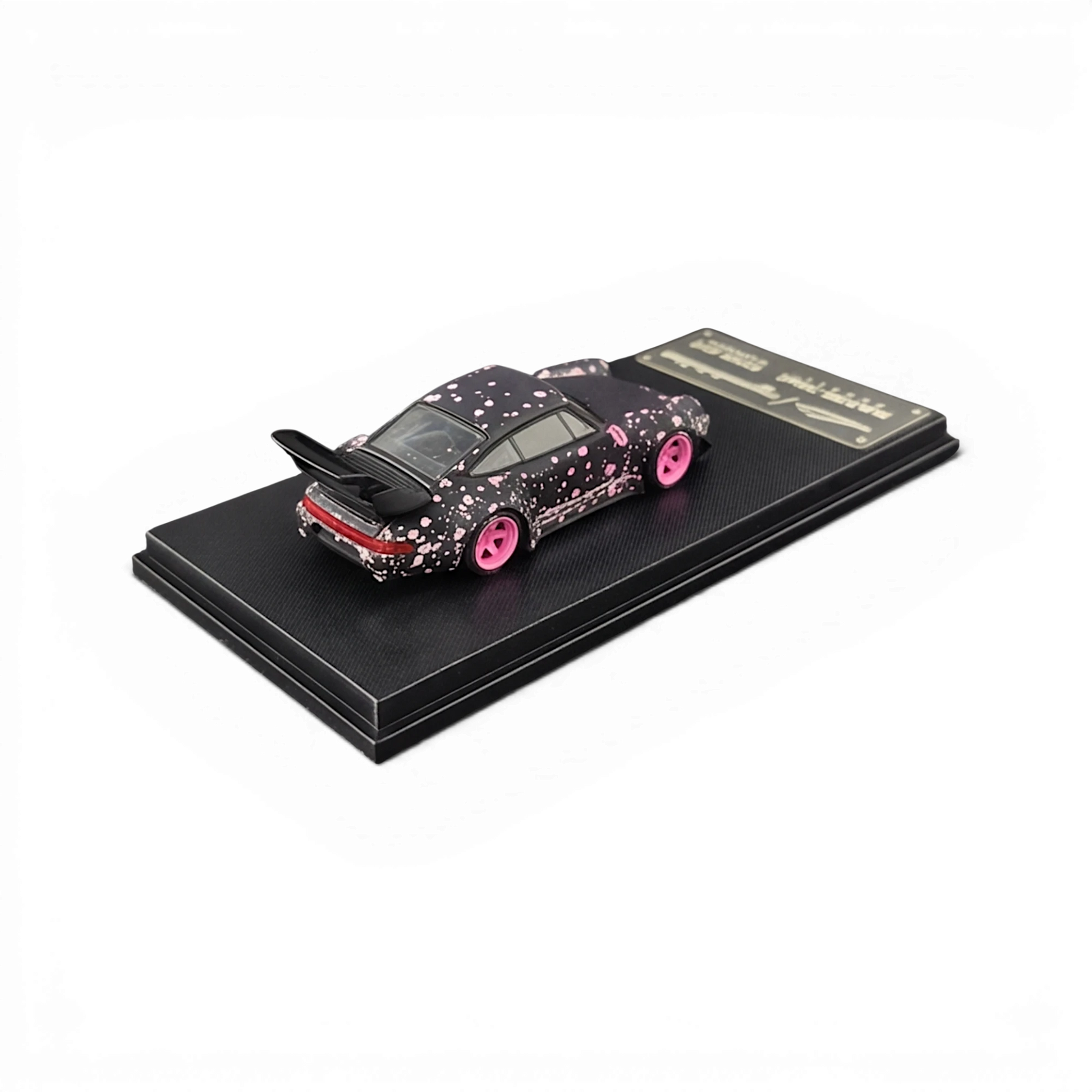 Lot57Supplies Diecast Shop MC RWB964 1:64 scale diecast car in black with pink sakura floral livery and high wing