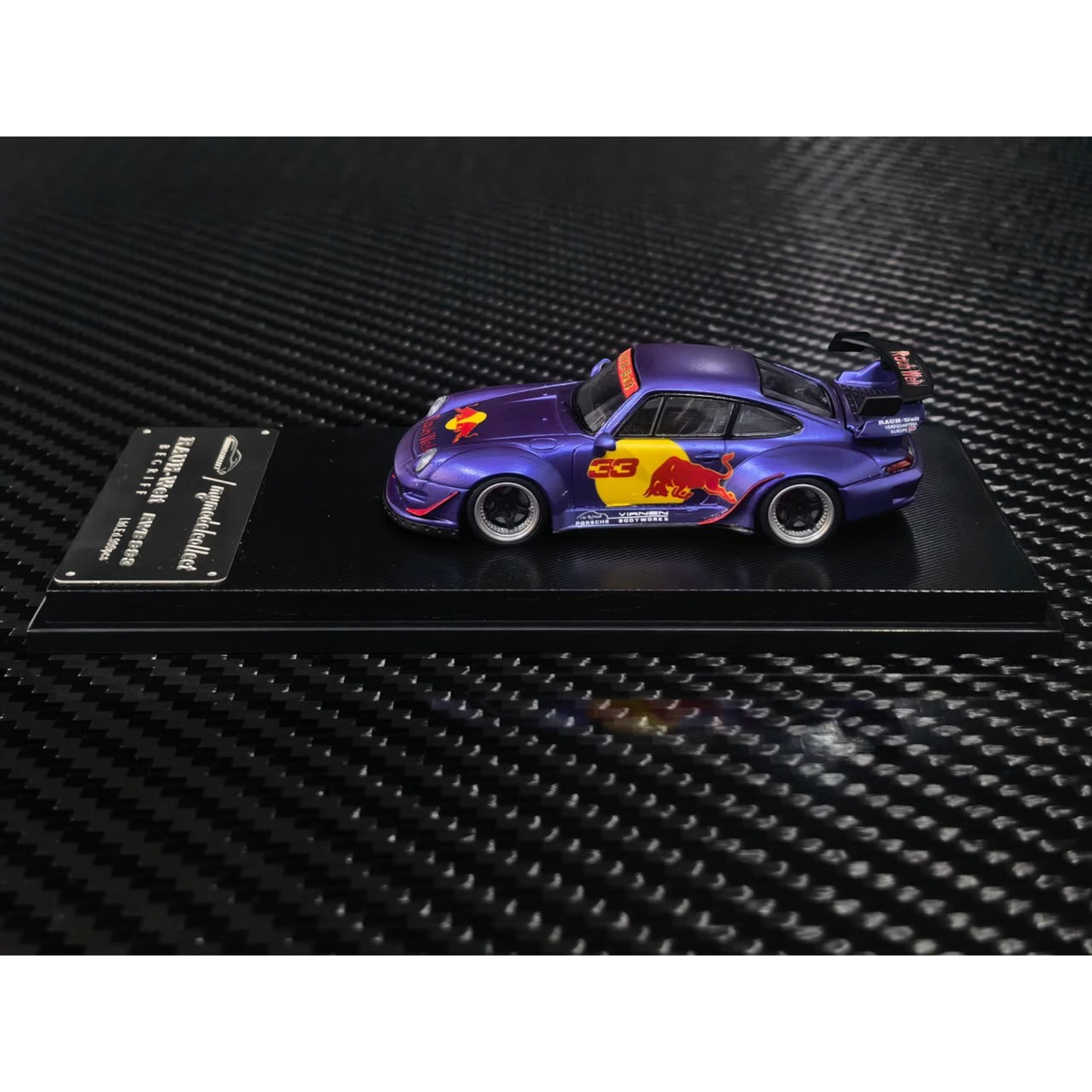 Lot57Supplies Diecast Shop 1:64 scale MC RWB993 diecast model car in matte purple with Red Bull livery and high wing