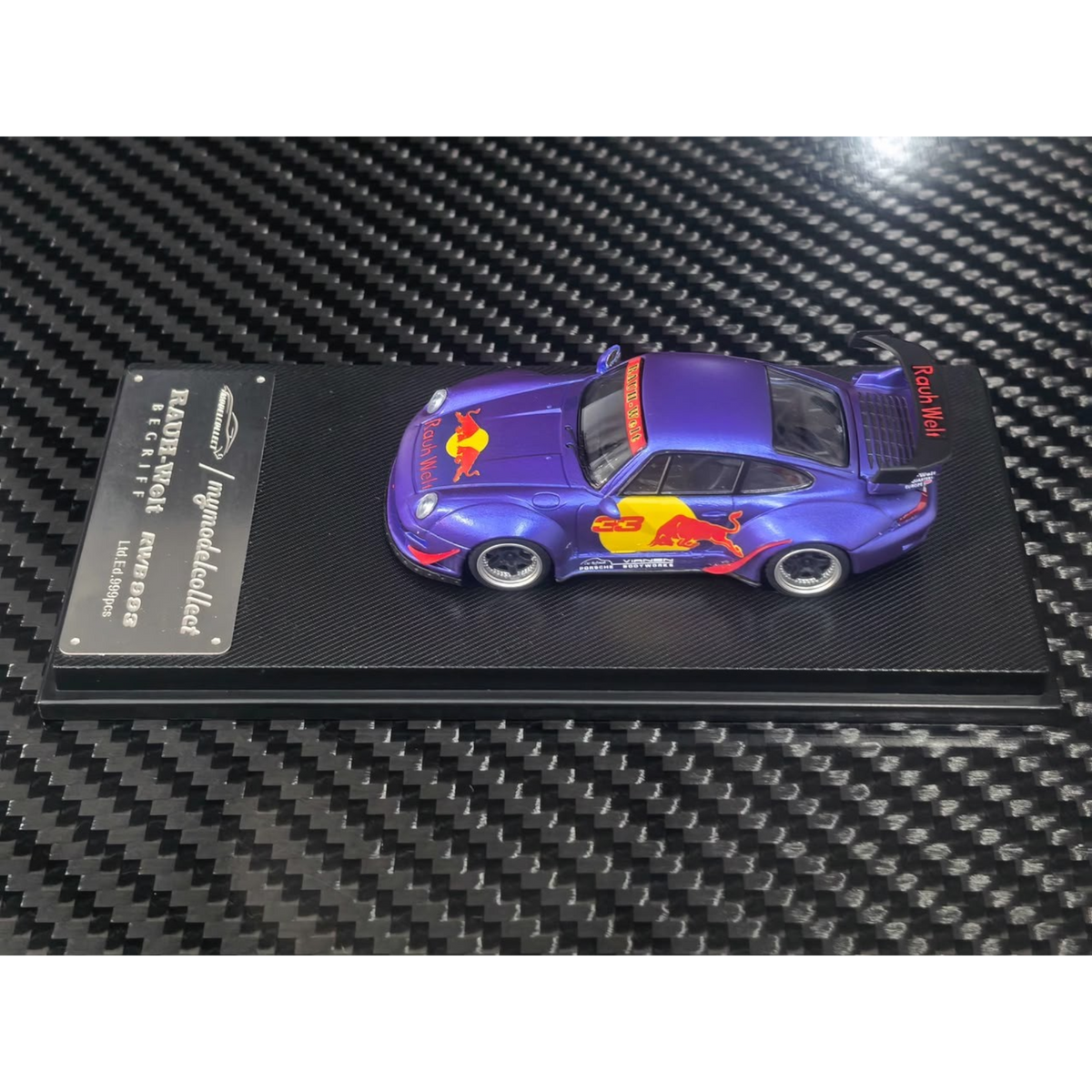 Lot57Supplies Diecast Shop MC RWB993 diecast model car in matte purple with Red Bull livery and high wing spoiler