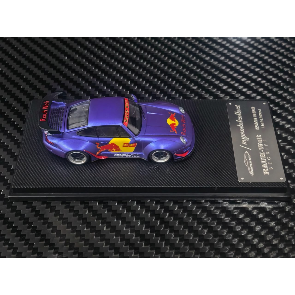 Lot57Supplies Diecast Shop 1:64 scale MC RWB993 diecast car in matte purple with Red Bull livery and high wing spoiler