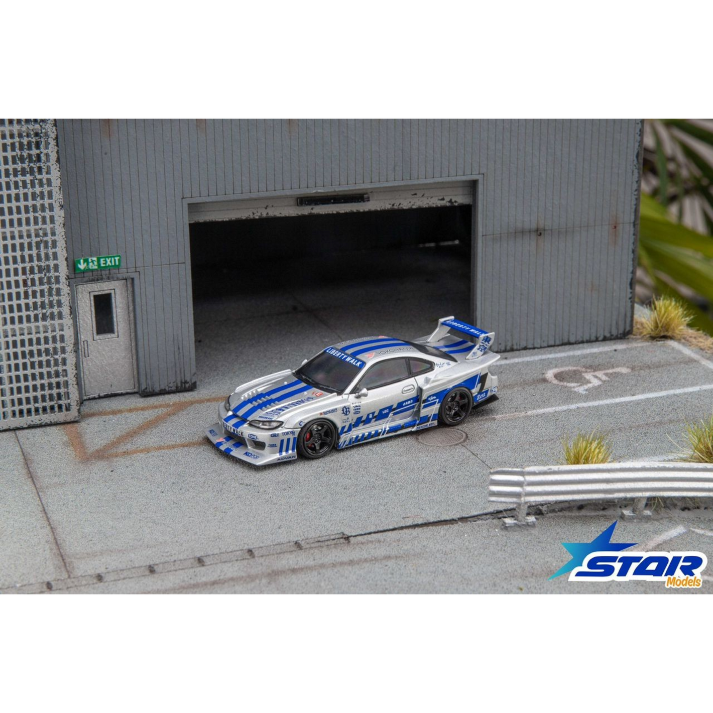 Lot57Supplies Diecast Shop Star Models 1:64 scale S15 Silvia widebody diecast car in silver and blue livery