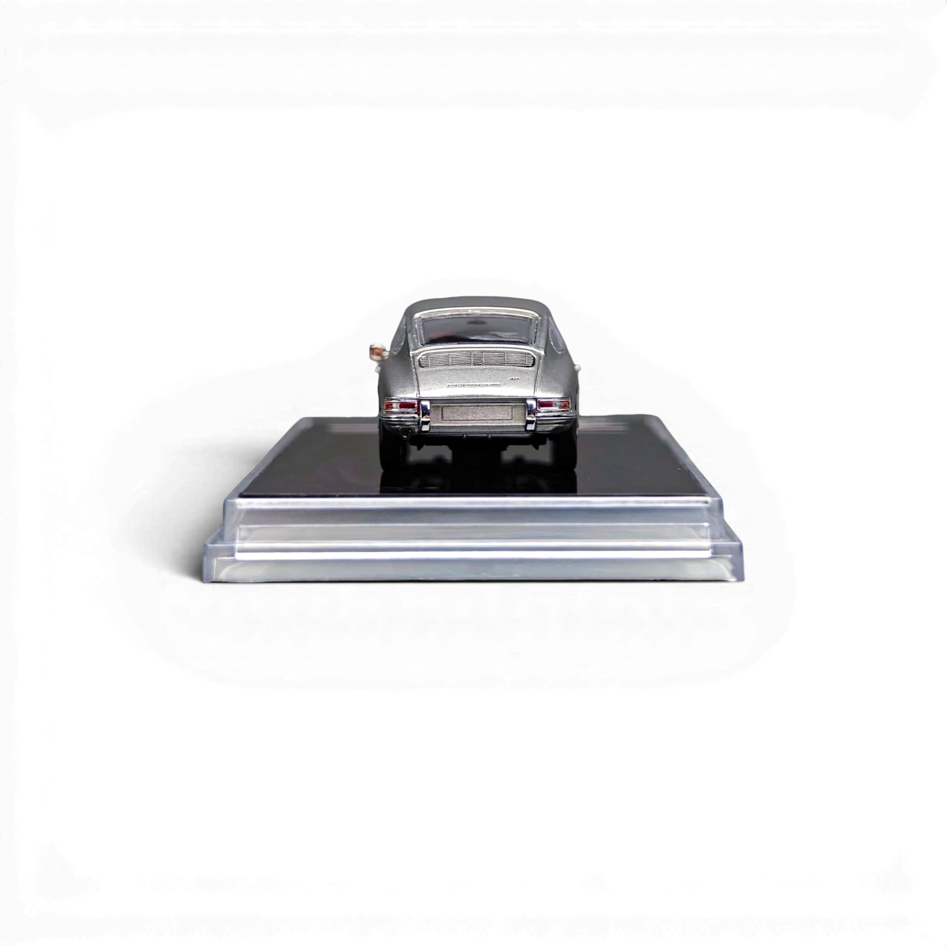 Lot57Supplies Diecast Shop Carport Model 911 diecast car in GT Silver, 1:64 scale, rear view on display base.