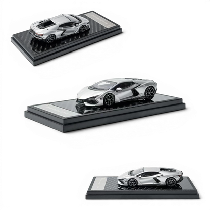 Lot57Supplies Diecast Shop 1:64 scale silver Lamborghini Revuelto diecast model car on a carbon fiber display base.
