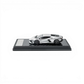 Lot57Supplies Diecast Shop 1:64 scale silver Lamborghini Revuelto diecast model car on a carbon fiber display base