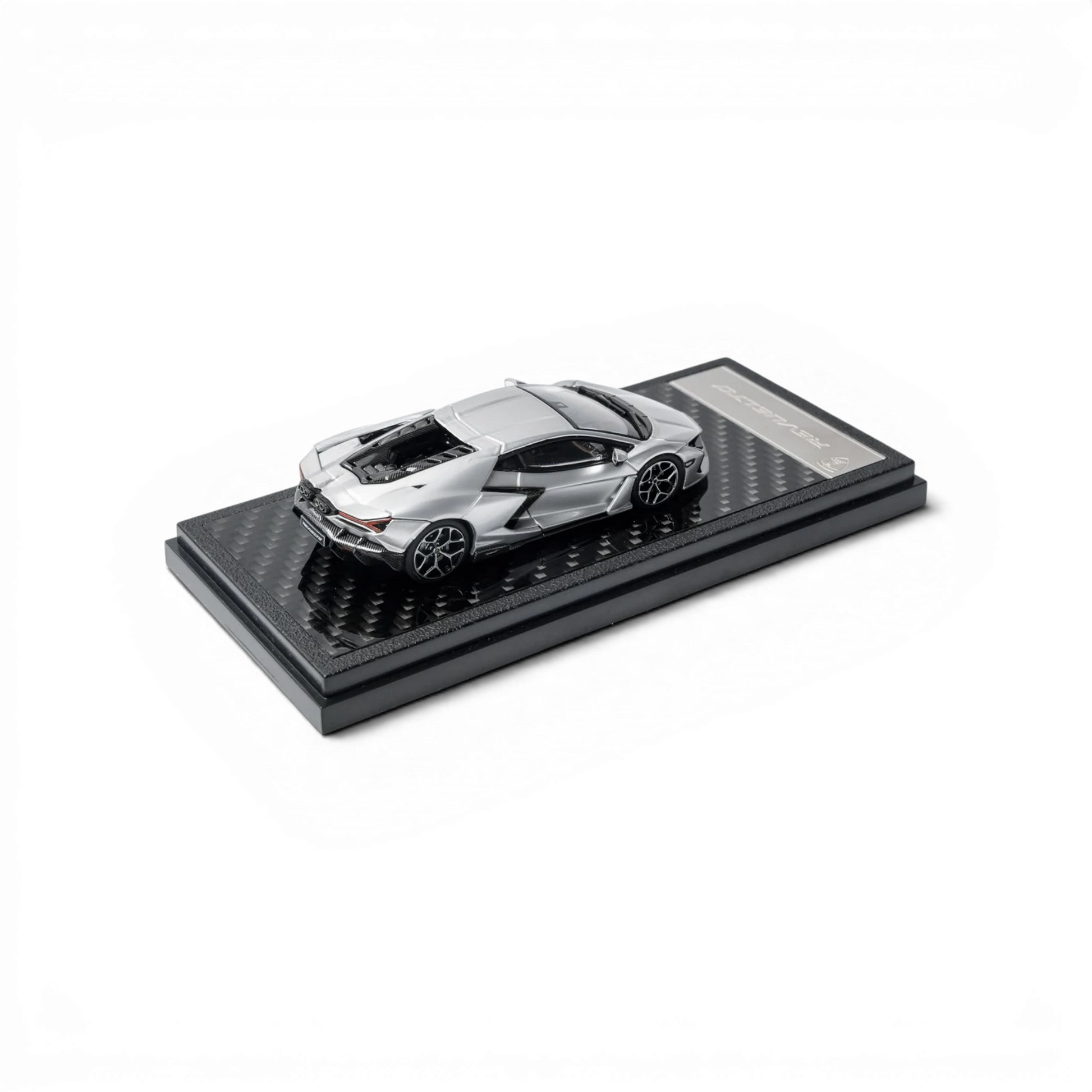Lot57Supplies Diecast Shop silver Lamborghini Revuelto 1:64 scale diecast model car on a carbon fiber display base