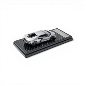 Lot57Supplies Diecast Shop silver Lamborghini Revuelto 1:64 scale diecast model car on a carbon fiber display base