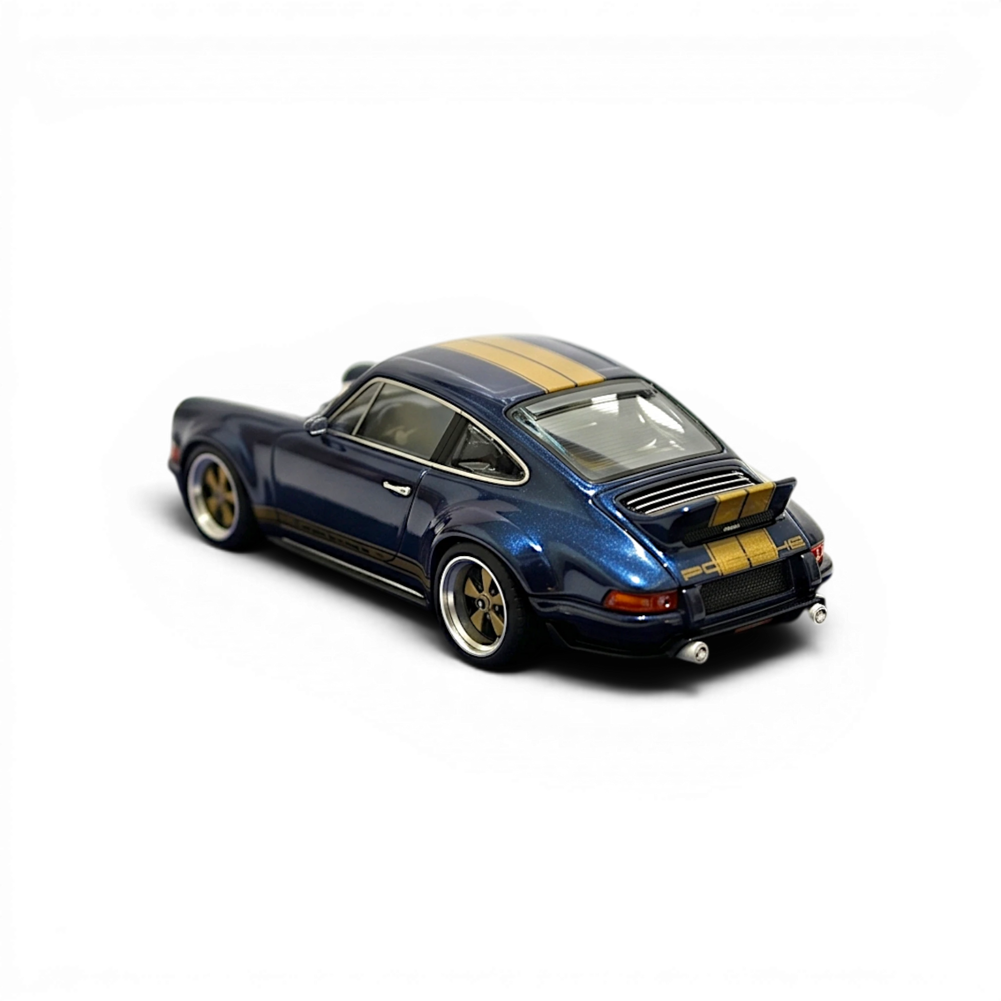 Lot57Supplies Diecast Shop 1:64 scale dark blue metallic gold Singer DLS resin model car with racing stripes.