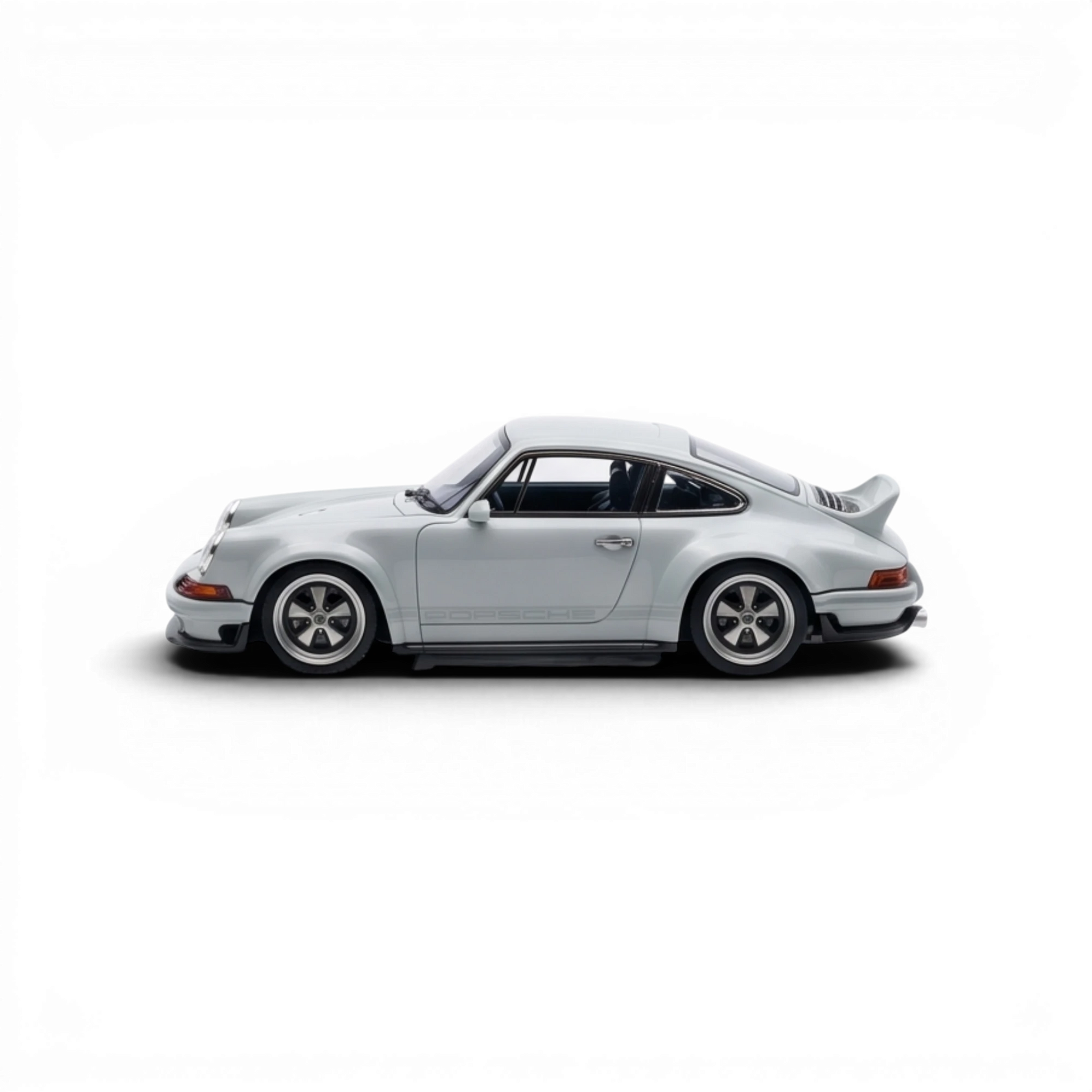 Lot57Supplies Diecast Shop 1:64 scale model of a Singer DLS in Sport Classic Grey resin with a rear spoiler and Porsche badging.