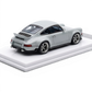 Lot57Supplies Diecast Shop 1:64 scale grey resin model of a Singer DLS Porsche with a rear spoiler and silver wheels on a white display base.