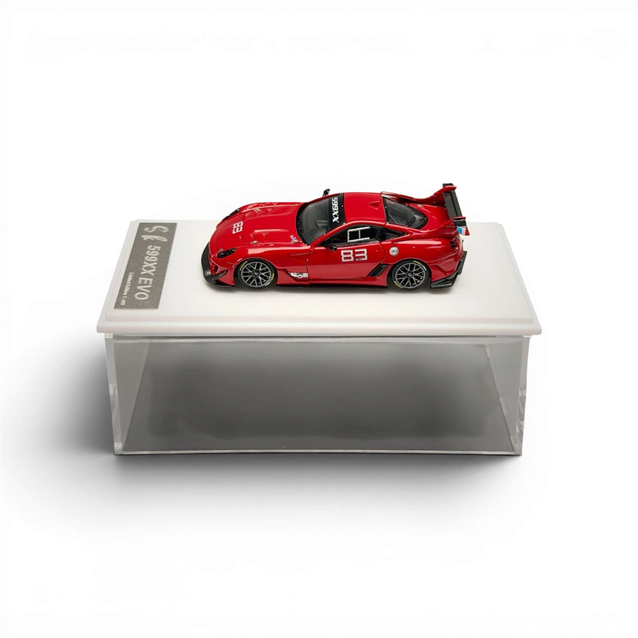 Lot57Supplies Diecast Shop red 1:64 scale SK Model Ferrari 599XX EVO with racing number 83 and large rear spoiler.