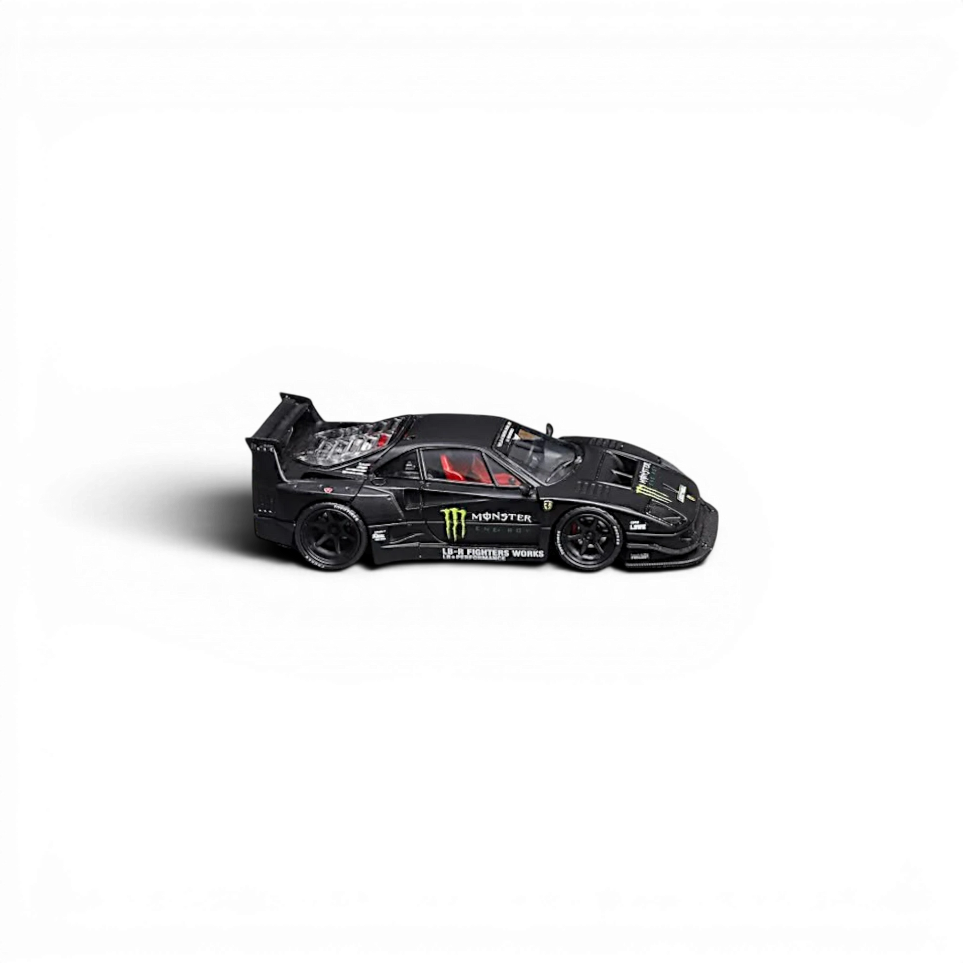 Lot57Supplies Diecast Shop Star Models 1:64 scale black F40 LB-Works wide-body supercar with Monster Energy livery