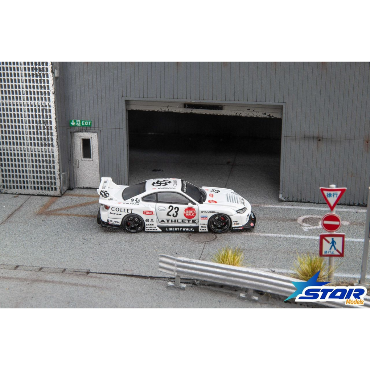 Lot57Supplies Diecast Shop 1:64 scale Star Models S15 Silvia widebody diecast car in white with 23 livery