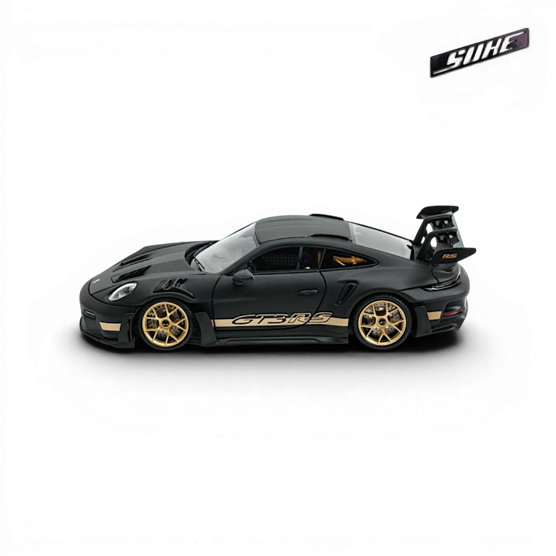 Lot57Supplies Diecast Shop SUHE 1:64 scale matte black Porsche 911 GT3 RS resin model with gold wheels.