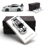 Lot57Supplies Diecast Shop SUHE 1:64 metallic white Porsche 911 GT3 RS resin model car with blue accents and display base