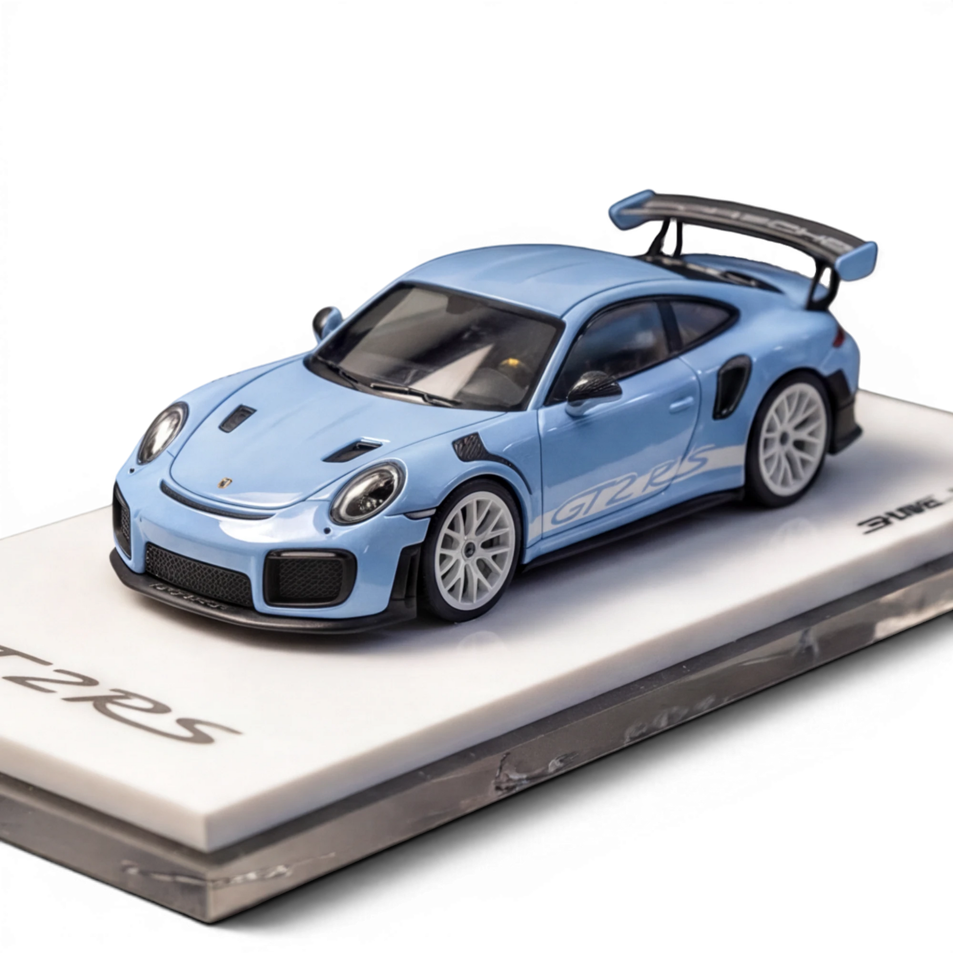 Lot57Supplies Diecast Shop SUHE Porsche GT2 RS 1:64 scale resin model in macaron blue with white wheels and GT2 RS graphics.