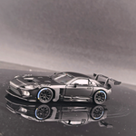 Lot57Supplies Diecast Shop 1:64 scale GT model Toyota GR GT3 diecast car in matte black with racing spoiler