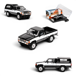 Lot57Supplies Diecast Shop 1:64 scale GCD Toyota Hilux Xtra Cab diecast model truck in black and white with camper shell.