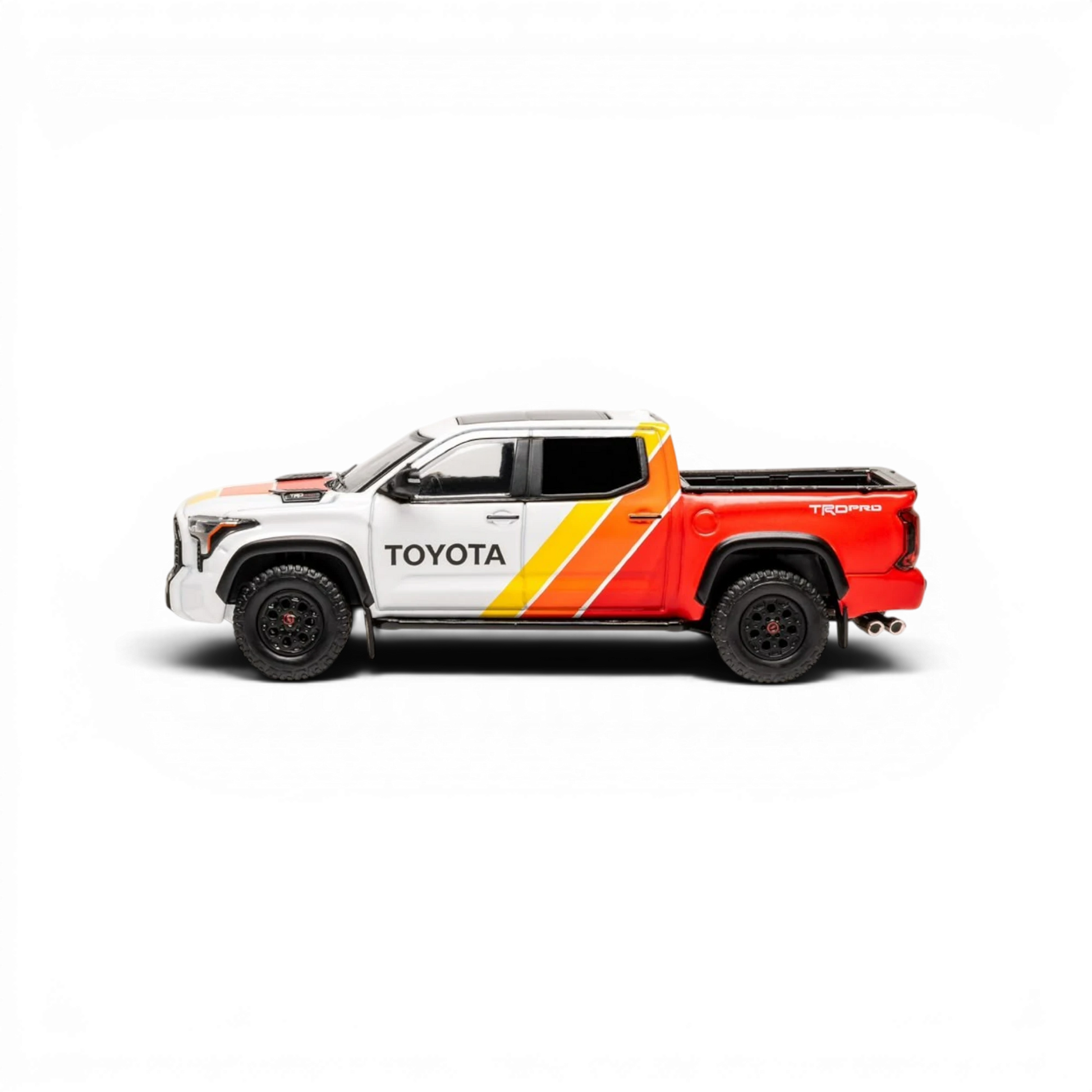 Lot57Supplies Diecast Shop 1:64 scale GCD Toyota Tundra TRD Pro diecast truck with three-color livery side view