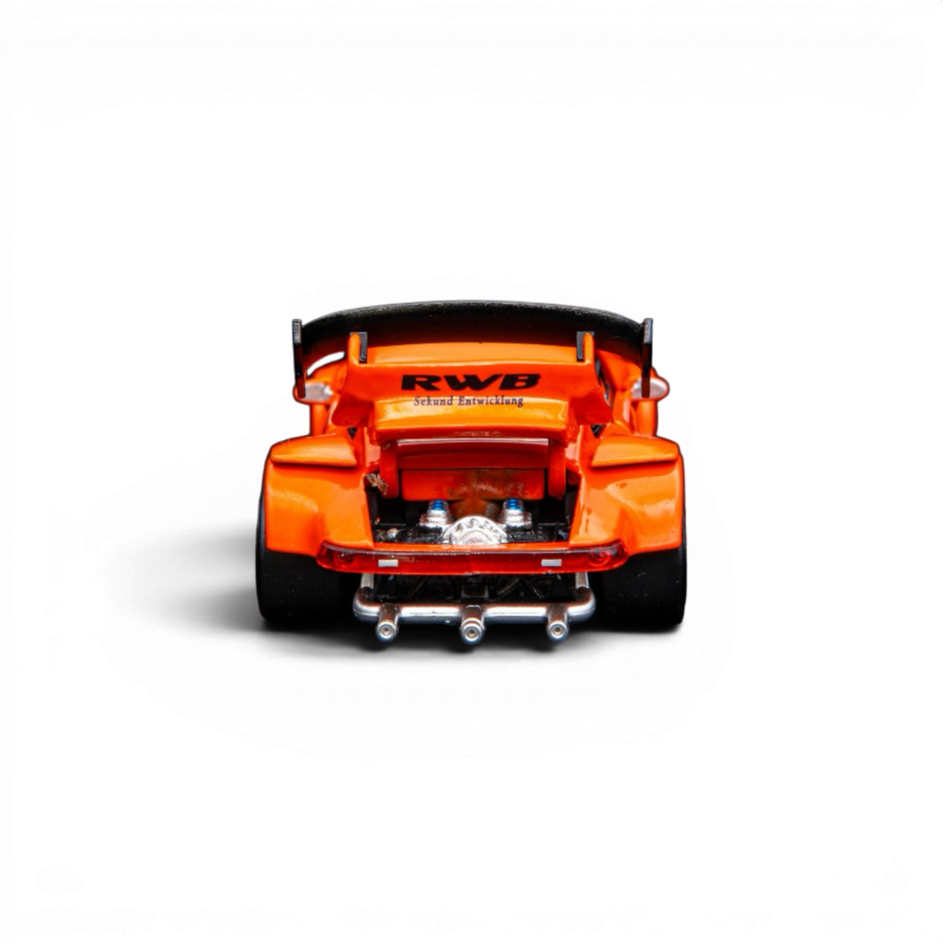 Lot57Supplies Diecast Shop TPC Custom RWB 930 1:64 scale diecast model in metallic orange with exposed engine and quad exhaust.