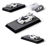 Lot57Supplies Diecast Shop VMB Agera R 1:64 scale white diecast model car with blue racing stripes, displayed on a grey felt base.