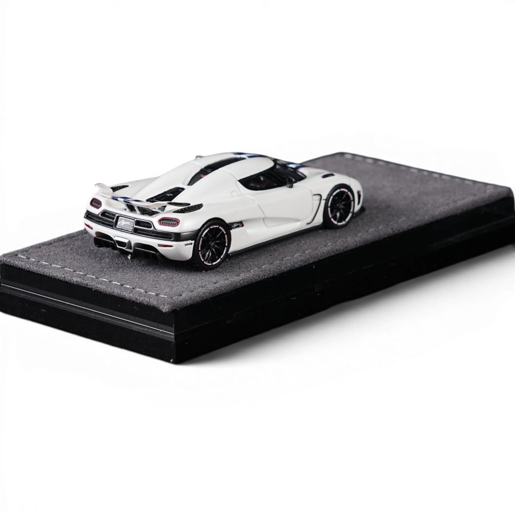 Lot57Supplies Diecast Shop 1:64 white diecast model car with blue racing stripes, Agera R model.