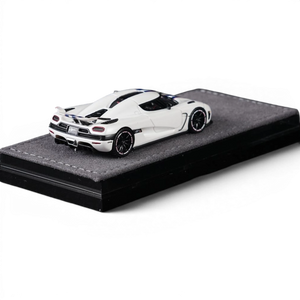 Lot57Supplies Diecast Shop 1:64 white diecast model car with blue racing stripes, Agera R model.