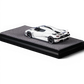 Lot57Supplies Diecast Shop VMB Agera R 1:64 scale white diecast model car with blue racing stripes on a grey display base.
