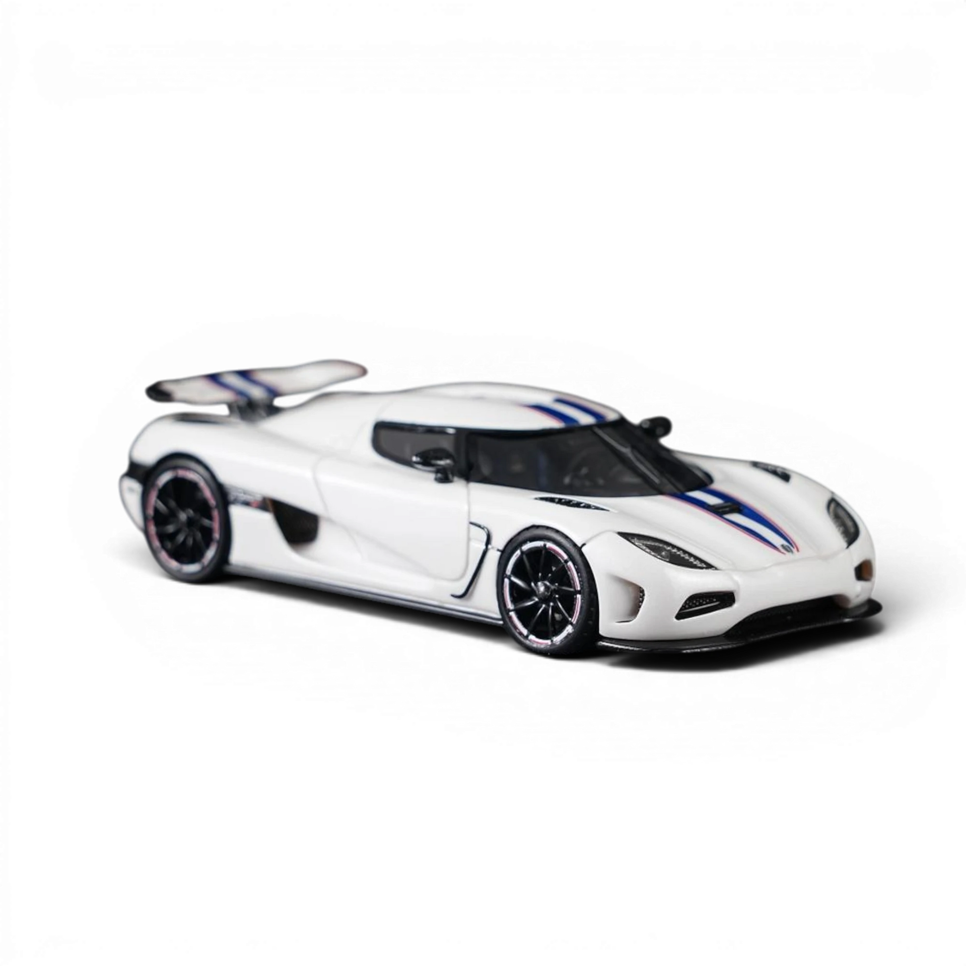 Lot57Supplies Diecast Shop VMB Agera R 1:64 scale white diecast model car with blue racing stripes.