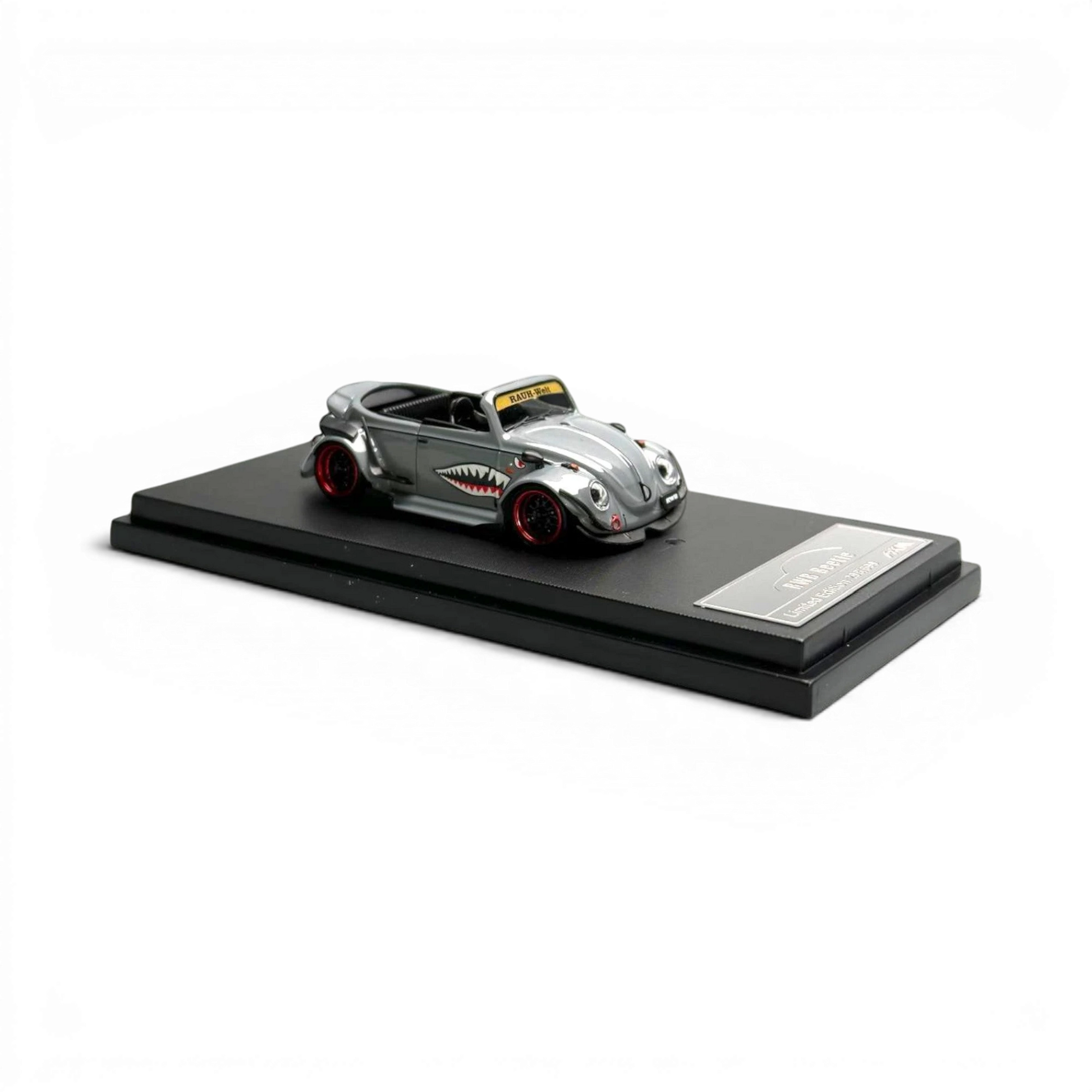 Lot57Supplies Diecast Shop grey 1:64 scale VW Beetle convertible with shark mouth graphics and red wheels.