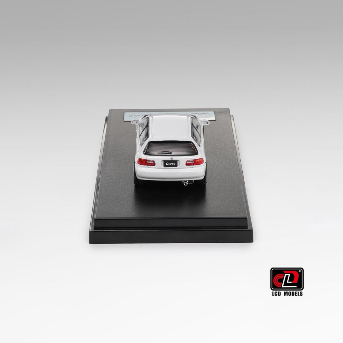 Lot57Supplies Diecast Shop 1:64 scale white Honda Civic SiR II EG6 diecast model car, rear view on display stand.